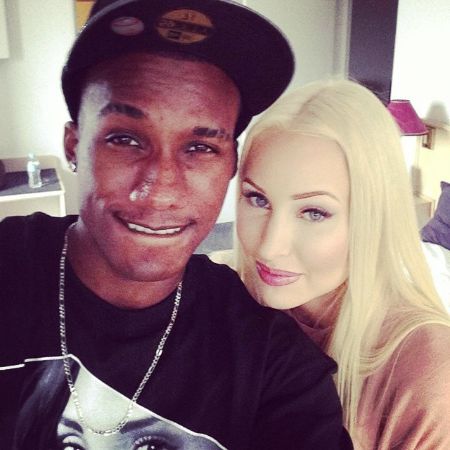 Hopsin and his ex-girlfriend Alyce Madden pose a picture.